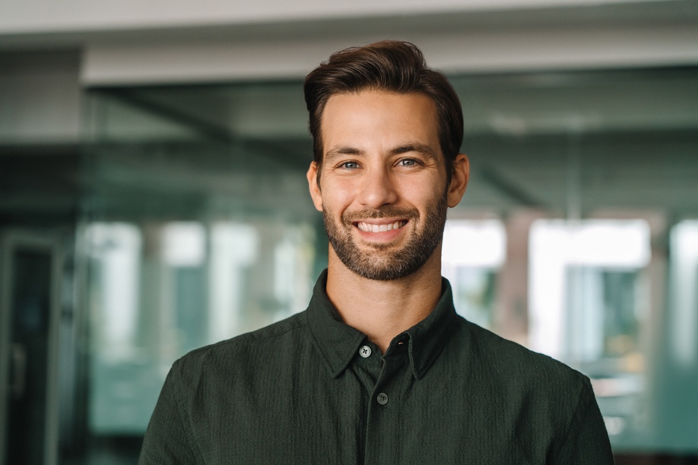satisfied smile after a precise and personalized dental care he received