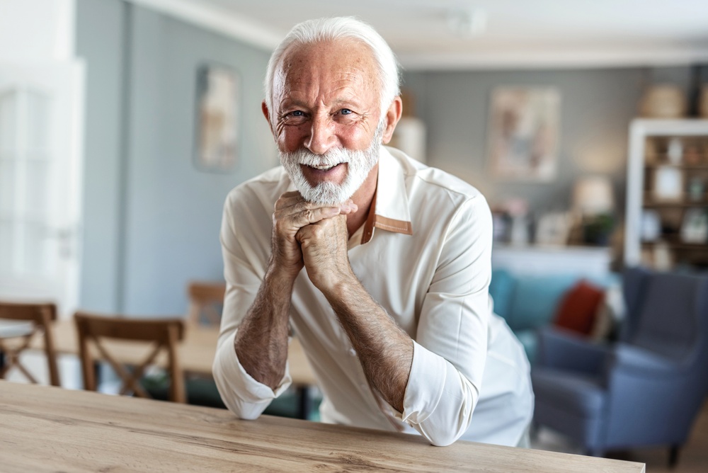 smiling man after dental implant
